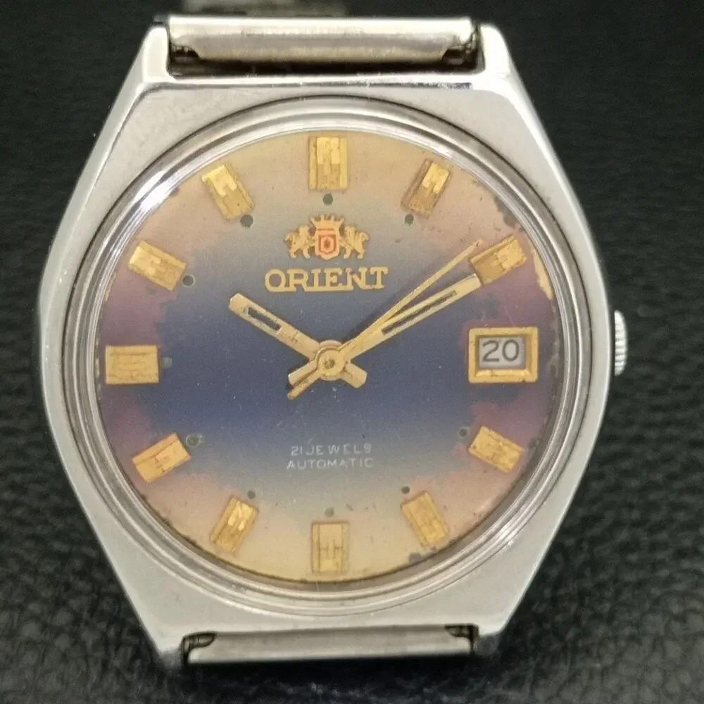 Vintage 1982 Orient Automatic Mens Silver Watch W/daydate & Blue accents